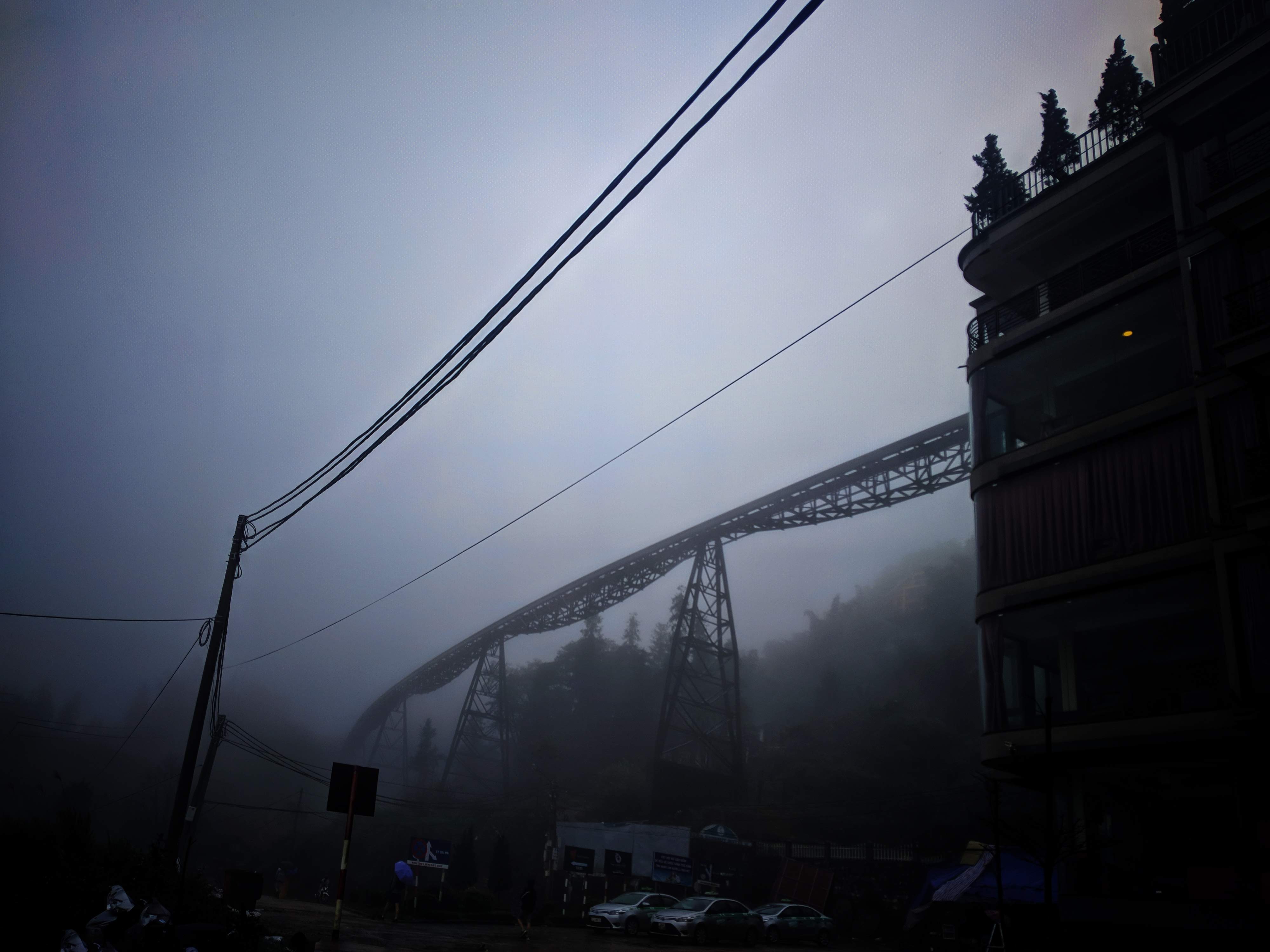 Foggy power lines and train tracks Vietnam
